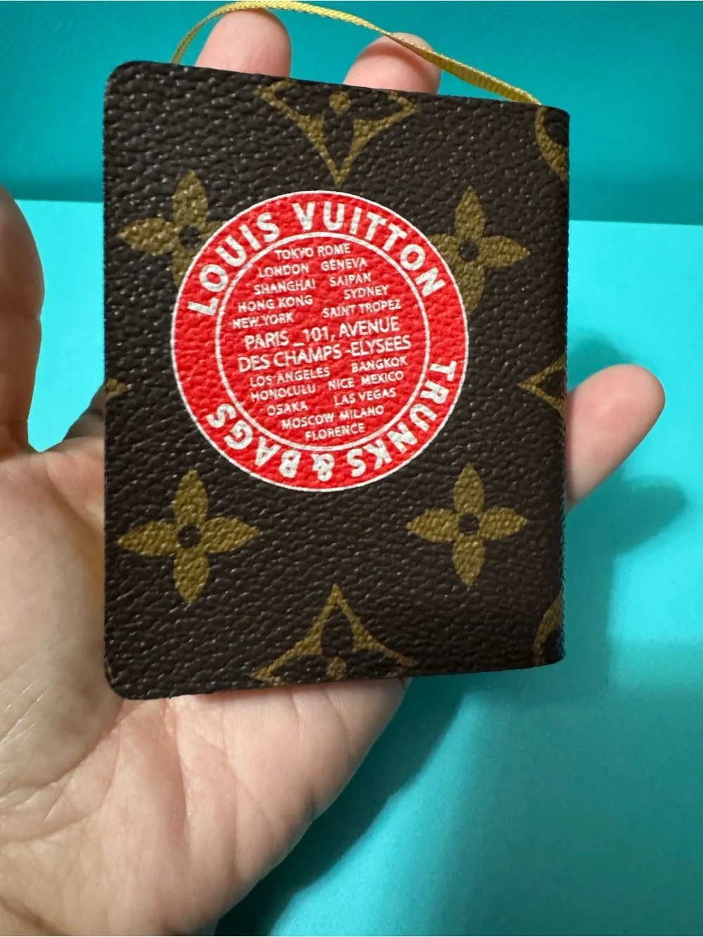 Louis Vuitton Brown Monogram Passport Cover with Blue-Cream Statue Motif